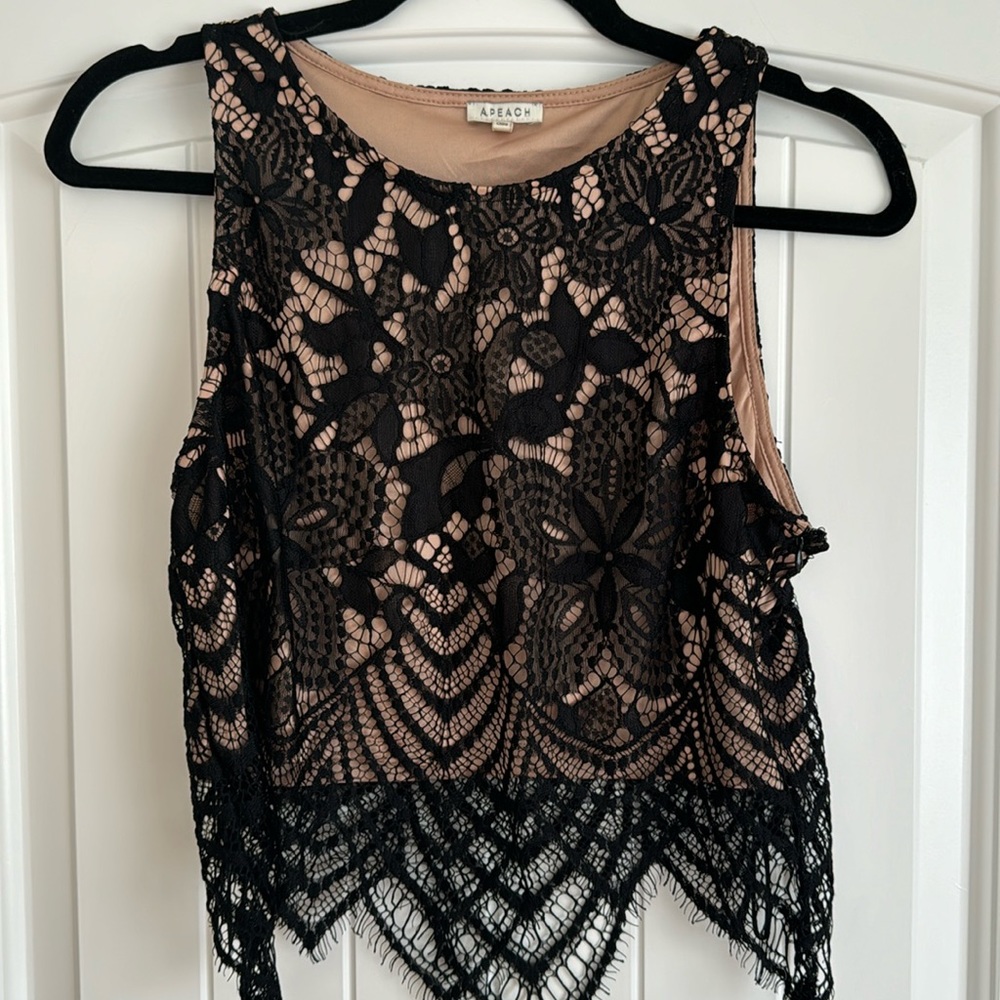 A.Peach black lace crop top size large